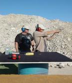 shooting a pistol at the range